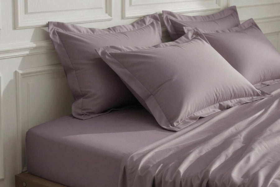 Plum bed linens with oxford border pillowcases