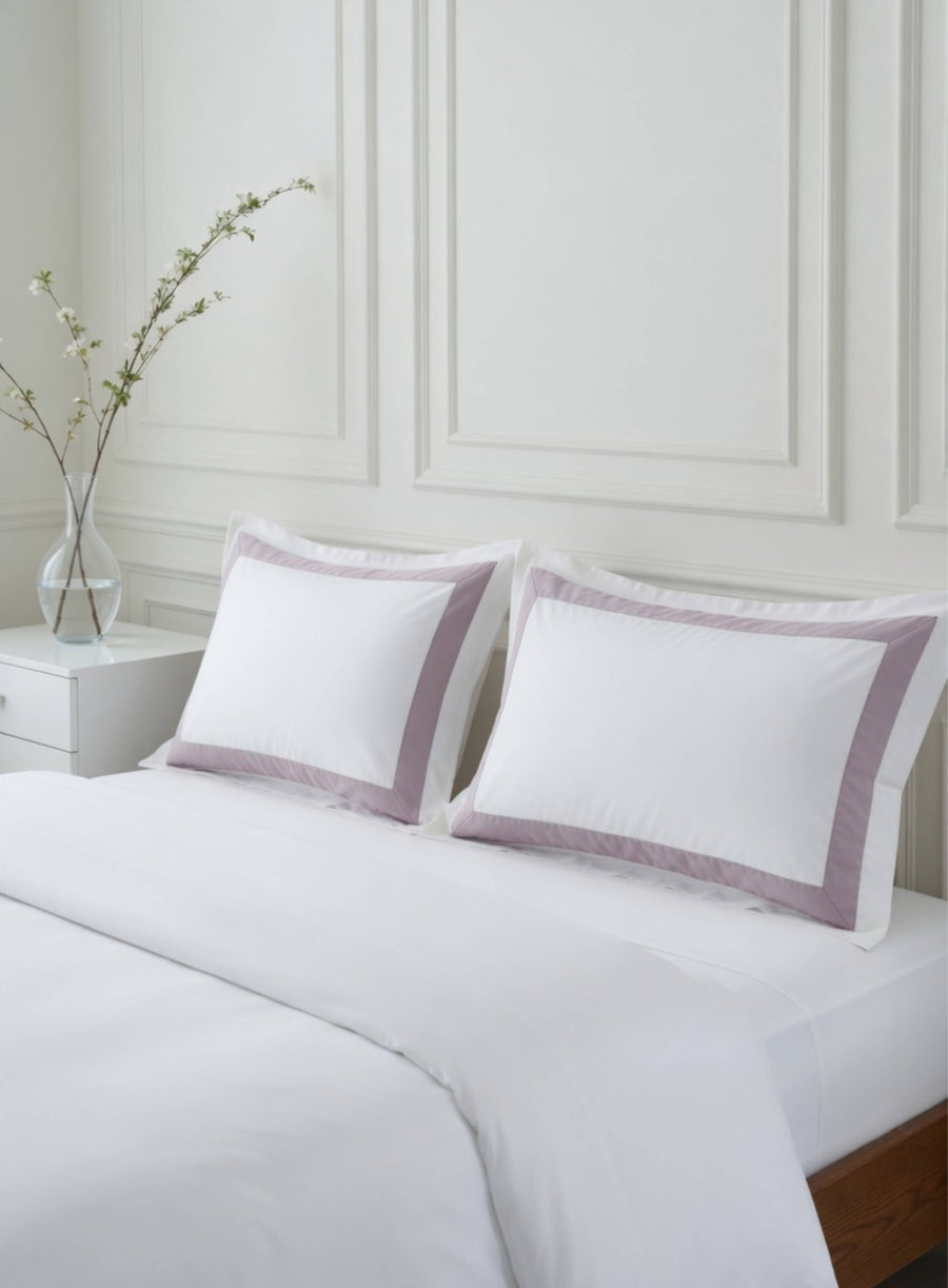 Banded bedding from House of march in plum band and white organic cotton