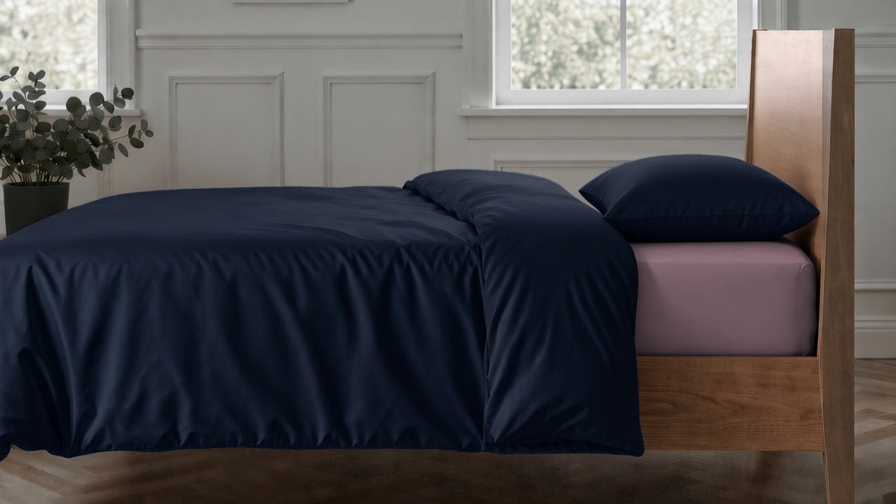 Navy 2026 duvet cover and pillowcase with Plum sheets