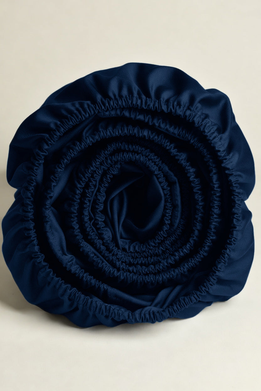 House of March Ink Blue organic cotton a rolled ink blue fitted sheet