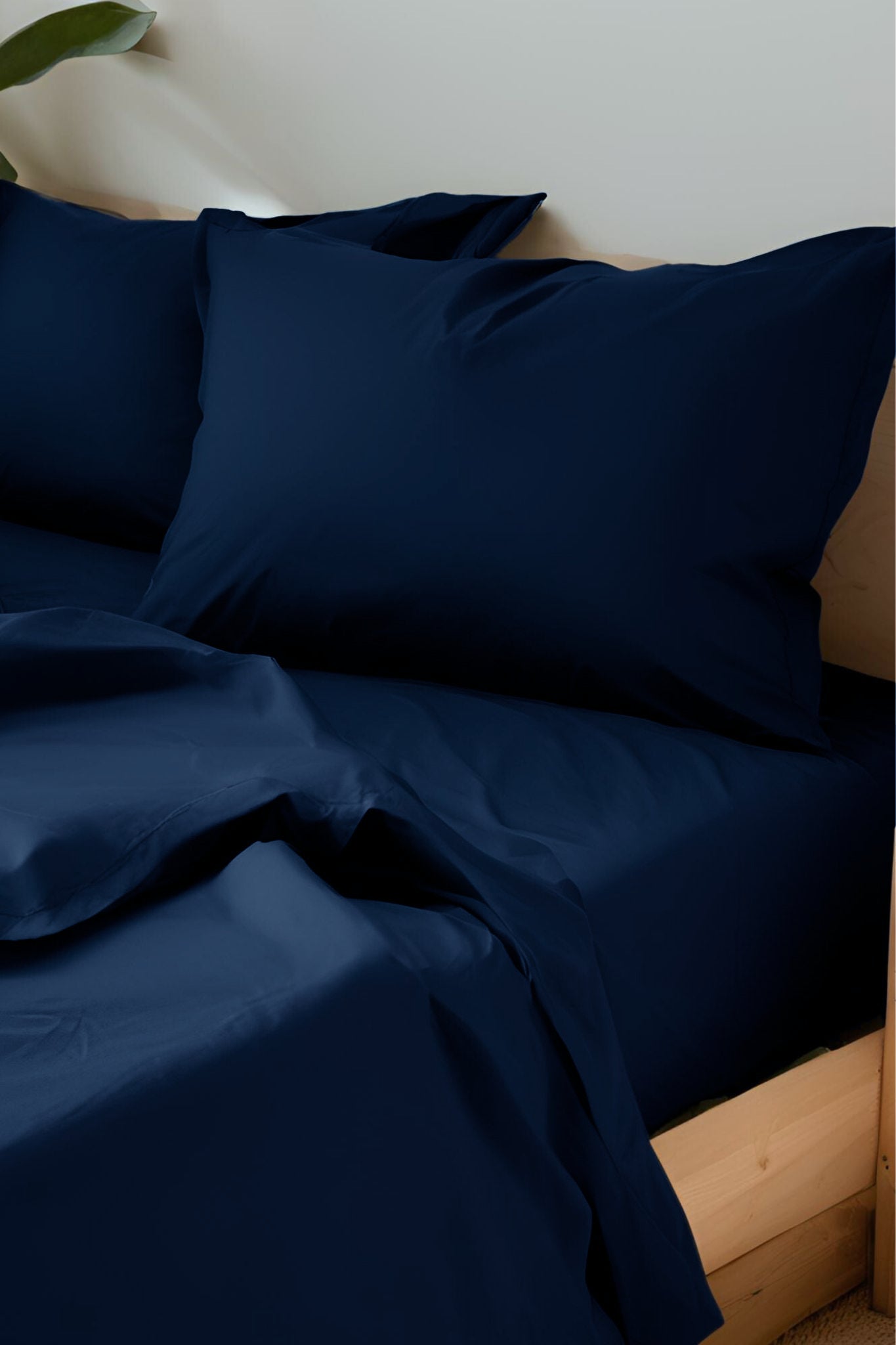 House of March Ink Blue organic cotton a close-up of ink blue sheets and pillowcases
