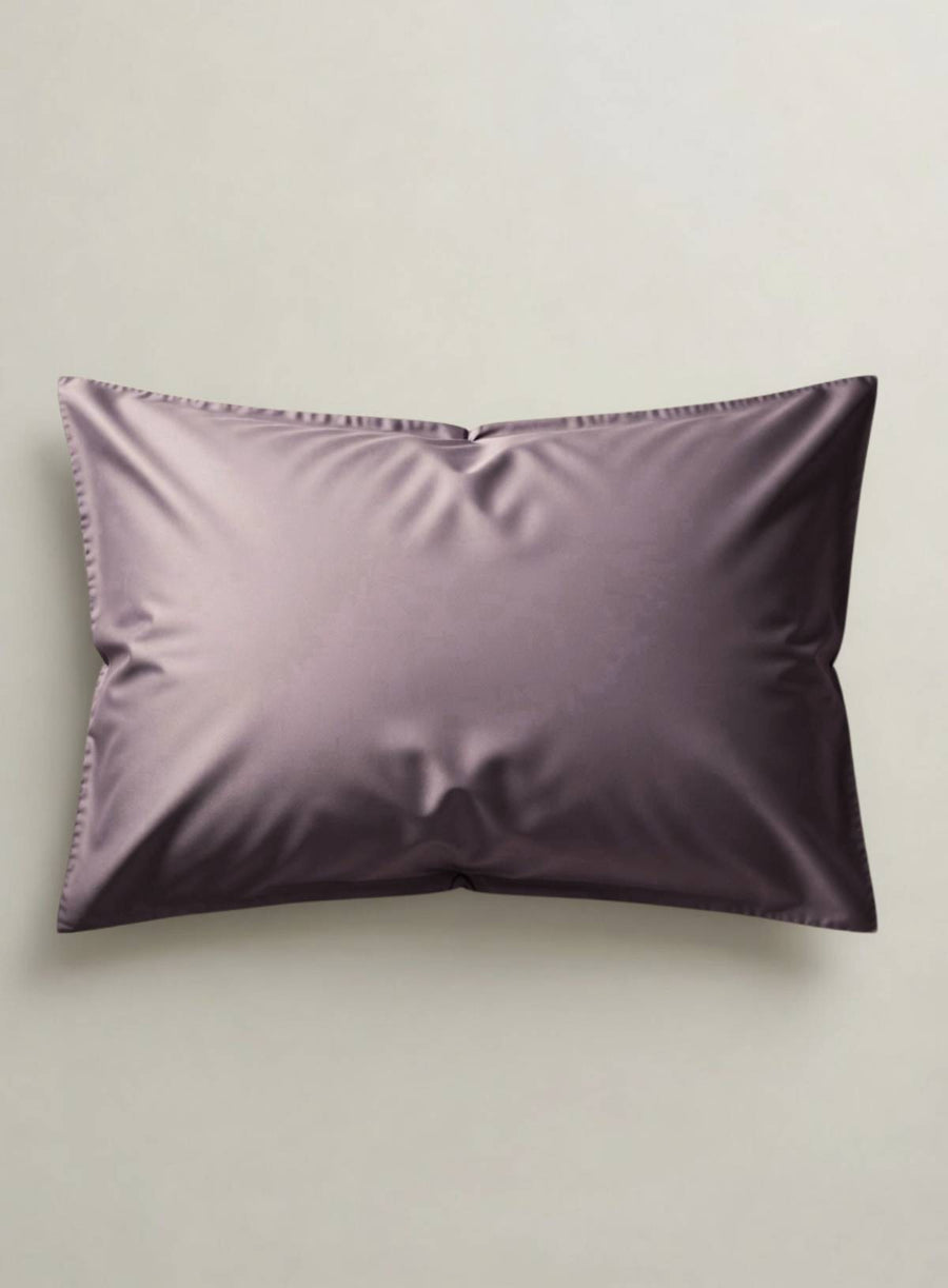 Plum satieen organic lodge pillowcase on a light gray background